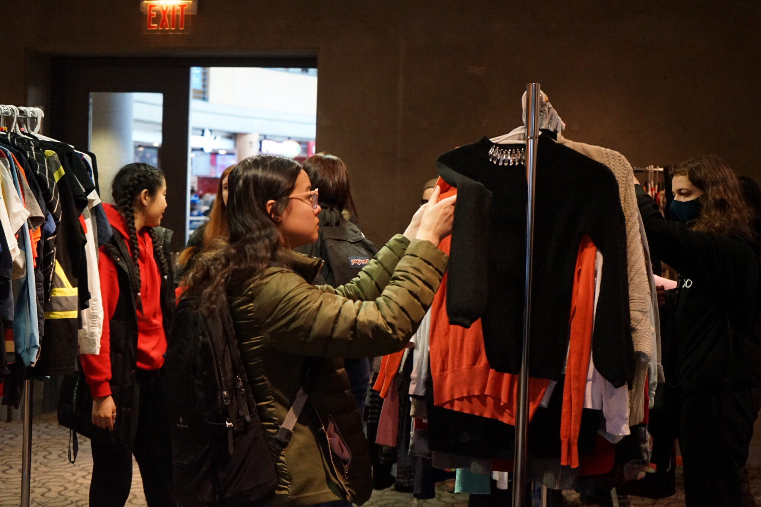 Students browsing clothes at WUSA Thrift Sidewalk Sale